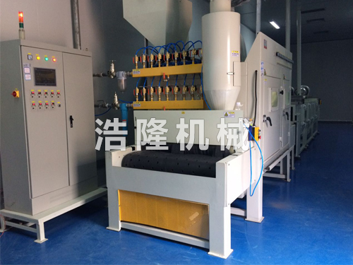 平面輸送式自動噴砂機實景圖 平面輸送式自動噴砂機實景圖